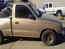 1999 TACOMA, GOLD, STD CAB, 2.4L, AT, 2WD.  Z25946